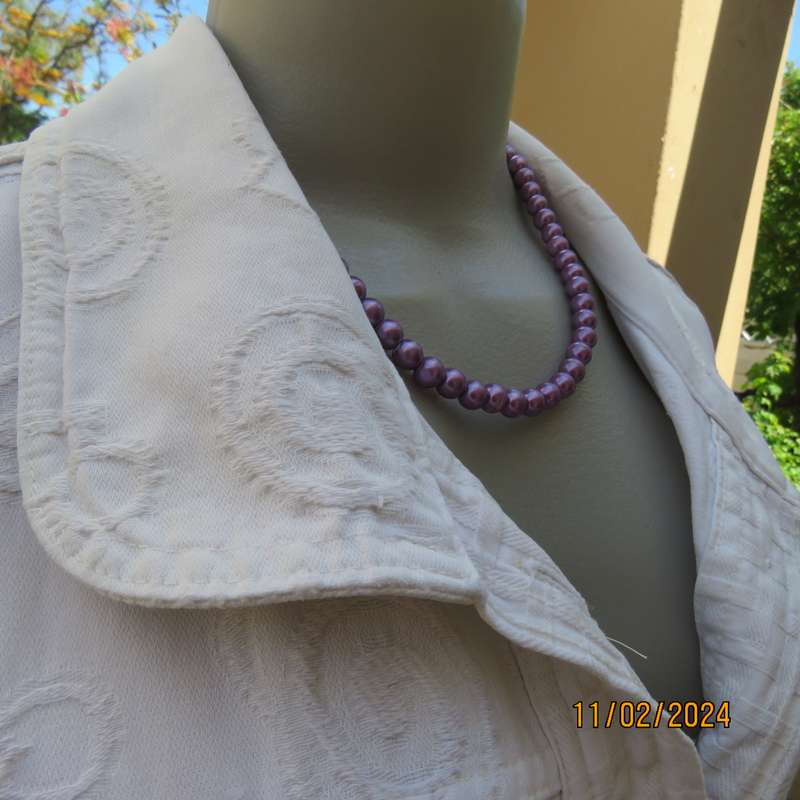 Must have white sleeveless patterned 100% cotton top-jacket. Drawstring hem. Pockets.Detail.Size 38.