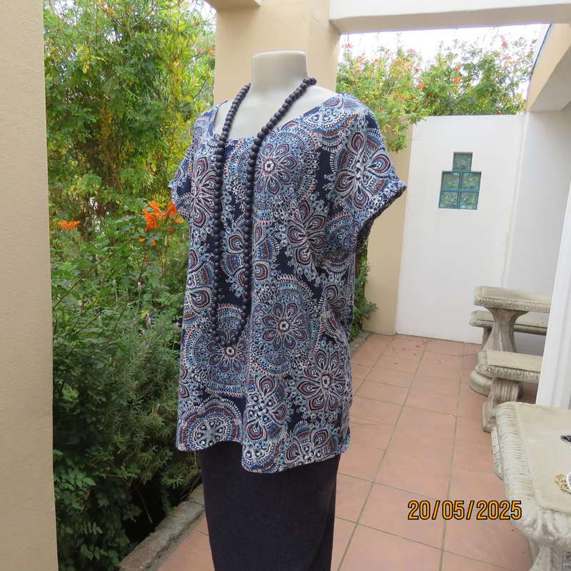 Slip over navy-white-blue bo-ho pattern polyester stretch top size 44.