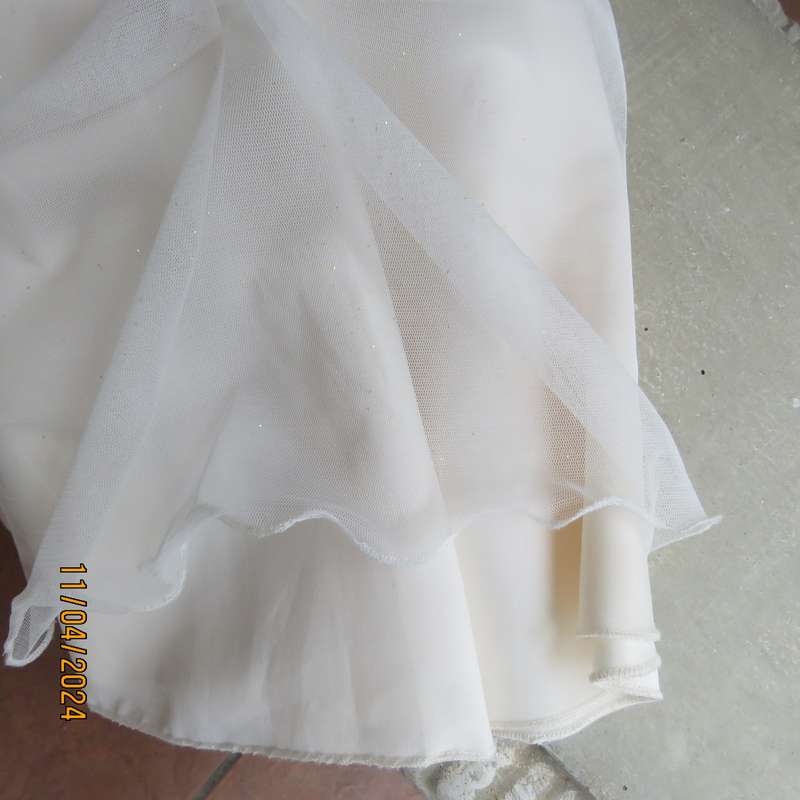 light cream size 28 dress in polyester satin with glam tulle overlay skirt