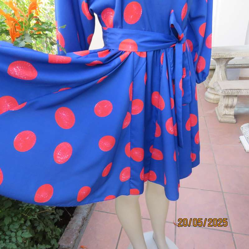 Silky poly-rayon royal blue with crimson circles knee length flare dress. Size 36.