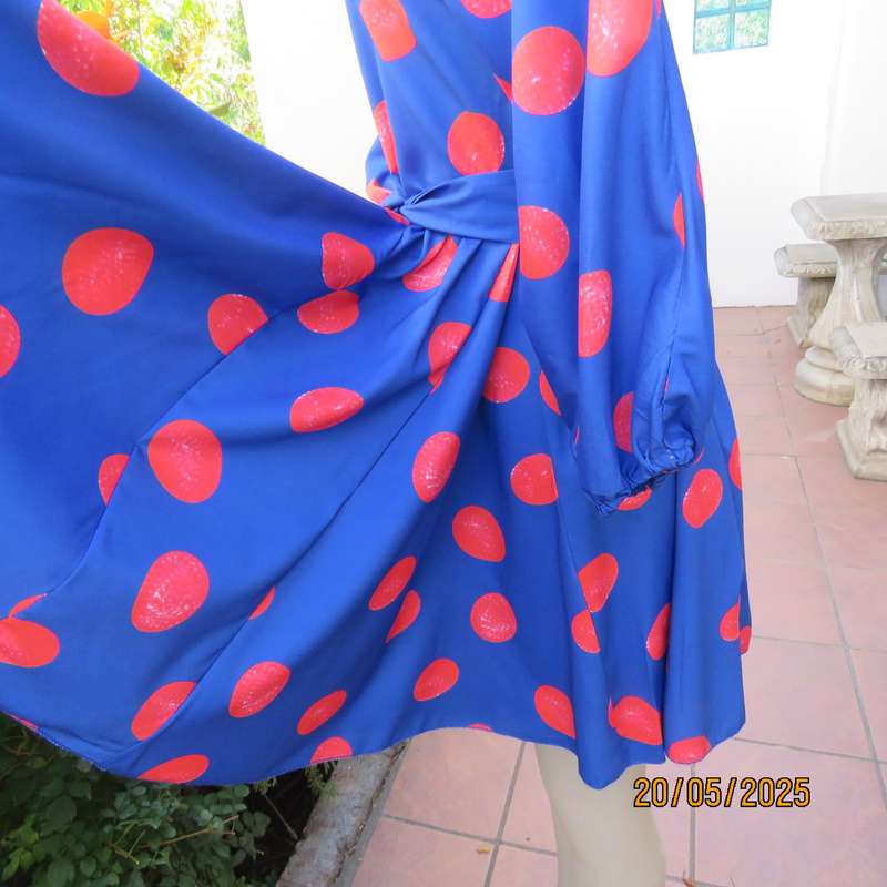 Silky poly-rayon royal blue with crimson circles knee length flare dress. Size 36.