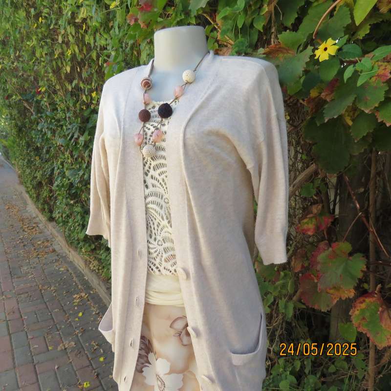 CHEROKEE cream acrylic-cotton knit short sleeve cardigan with button down front. Size 36.