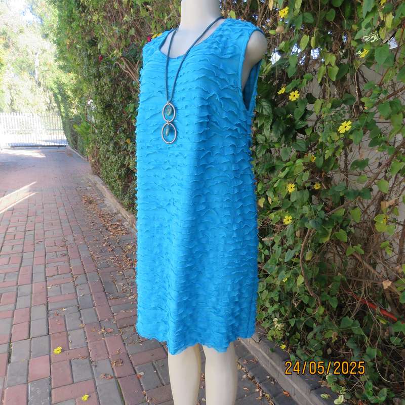 Jade colour sleeveless dress with sheer polyester coat. Boutique made size 40.