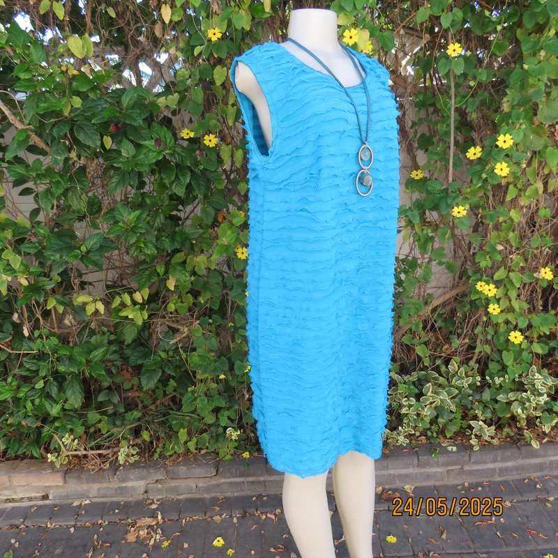 Jade colour sleeveless dress with sheer polyester coat. Boutique made size 40.