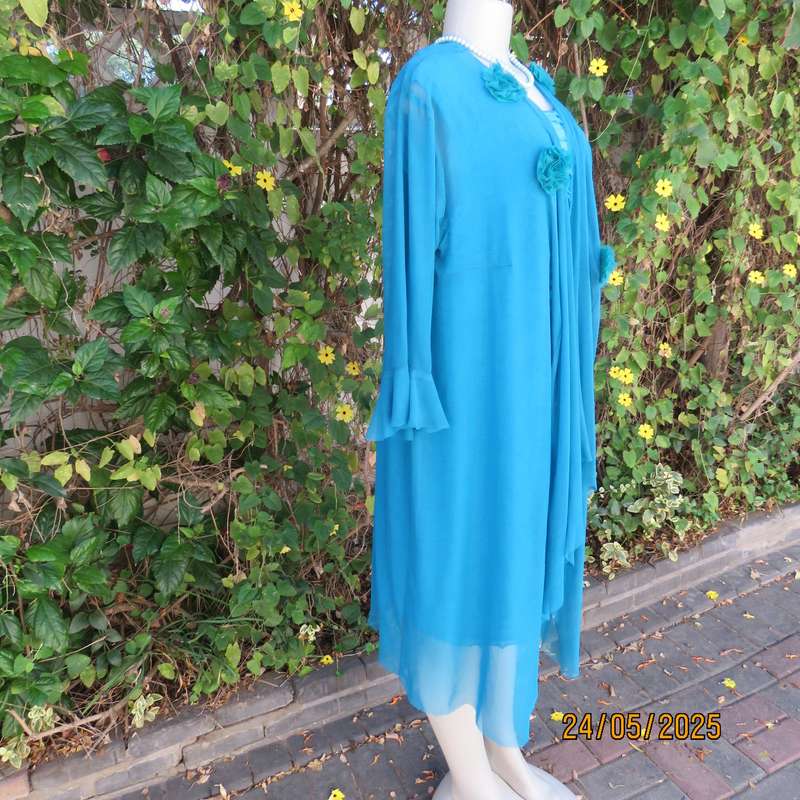 Jade colour sleeveless dress with sheer polyester coat. Boutique made size 40.