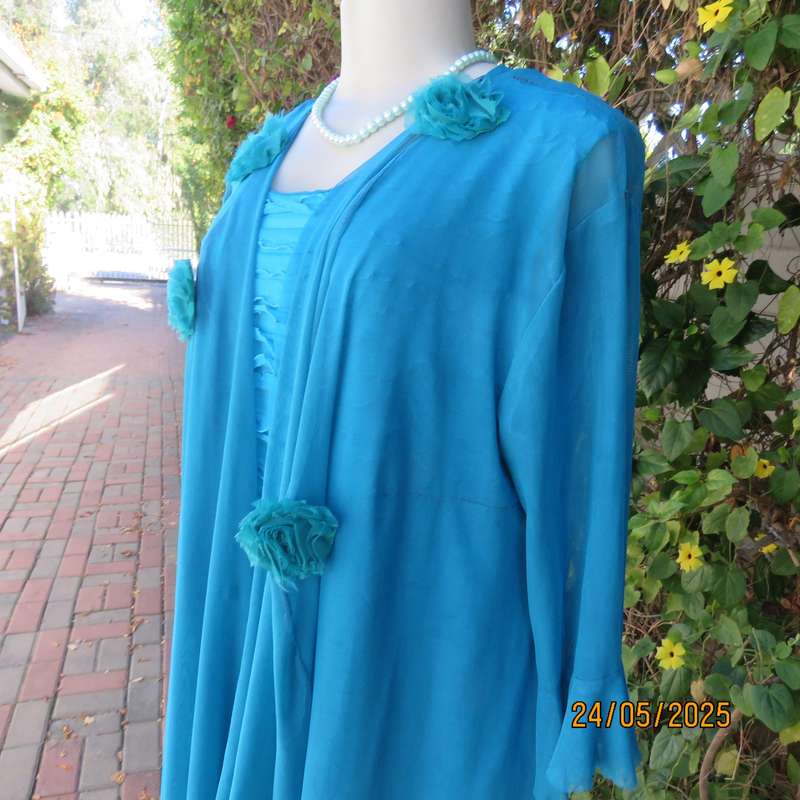 Jade colour sleeveless dress with sheer polyester coat. Boutique made size 40.
