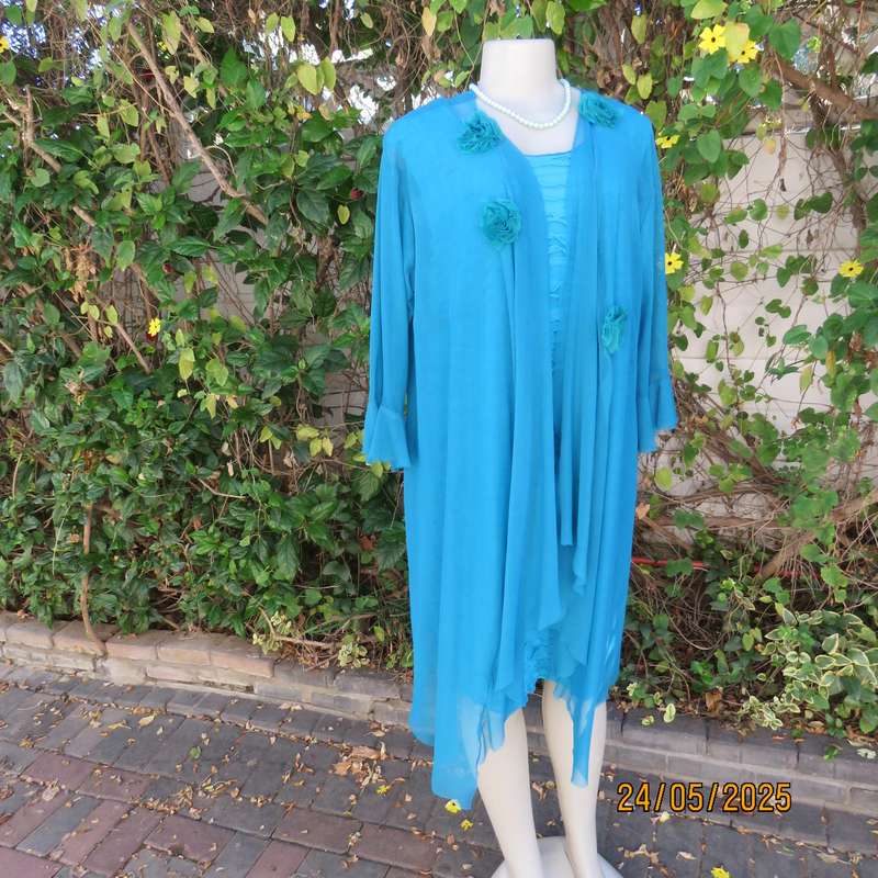 Jade colour sleeveless dress with sheer polyester coat. Boutique made size 40.