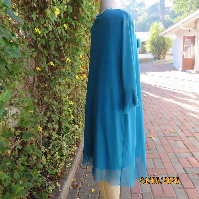 Jade colour sleeveless dress with sheer polyester coat. Boutique made size 40.