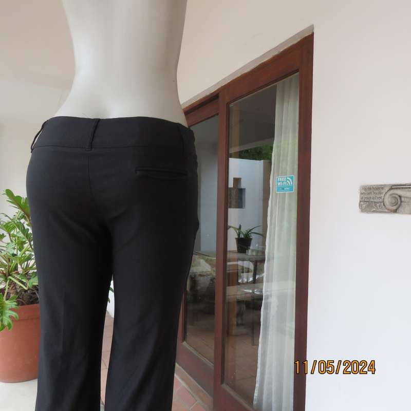 Sexy black low rise size 36 TRUWORTHS nylon-rayon stretch pants. Wide yoked waistband. As new cond