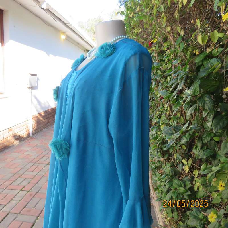 Jade colour sleeveless dress with sheer polyester coat. Boutique made size 40.