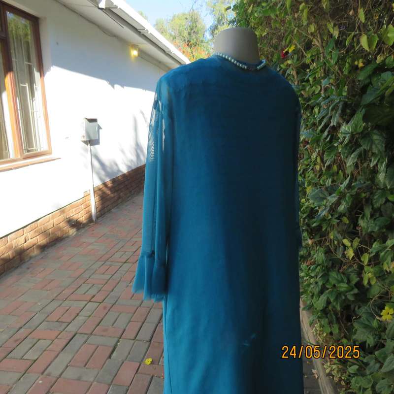 Jade colour sleeveless dress with sheer polyester coat. Boutique made size 40.