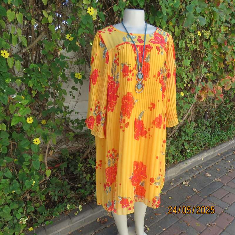 JUDY'S PRIDE vibrant orange slip over permanent pleated lined dress. Crimson flowers. Size 40