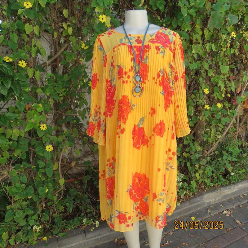 JUDY'S PRIDE vibrant orange slip over permanent pleated lined dress. Crimson flowers. Size 40