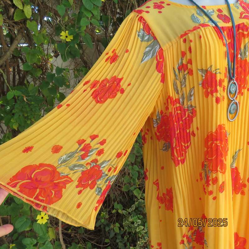 JUDY'S PRIDE vibrant orange slip over permanent pleated lined dress. Crimson flowers. Size 40