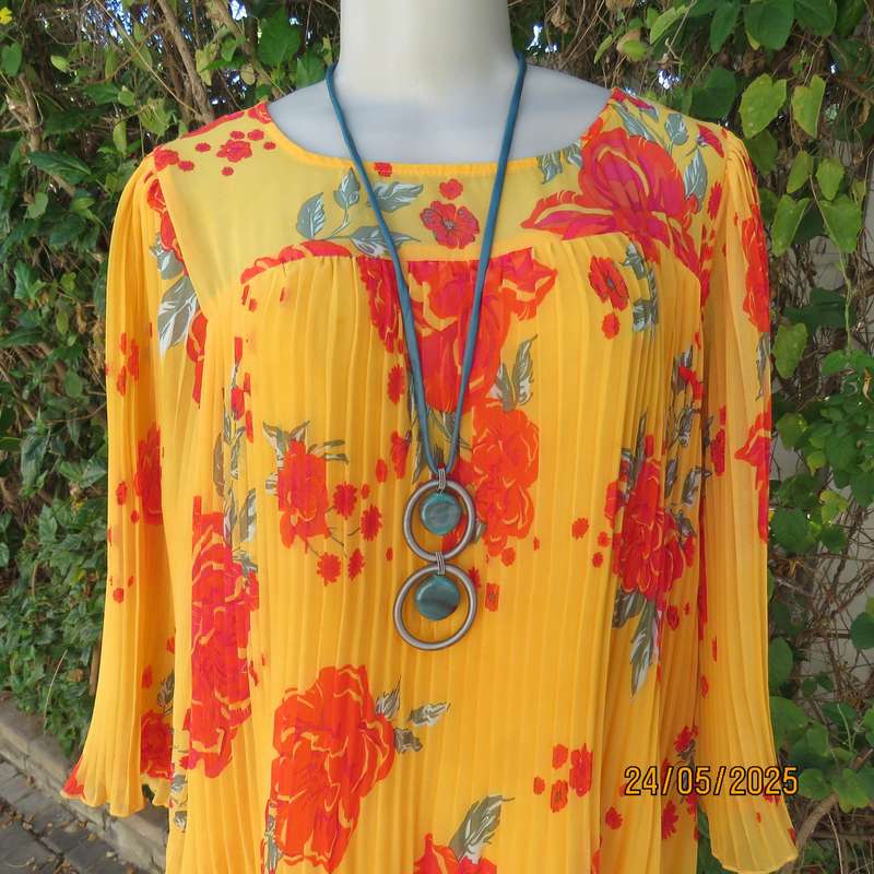 JUDY'S PRIDE vibrant orange slip over permanent pleated lined dress. Crimson flowers. Size 40