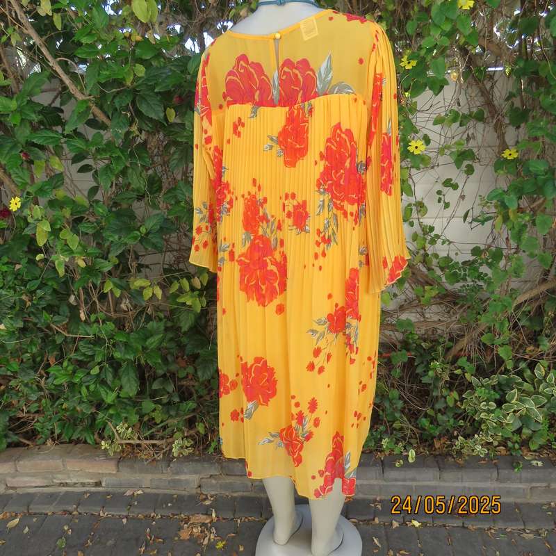 JUDY'S PRIDE vibrant orange slip over permanent pleated lined dress. Crimson flowers. Size 40