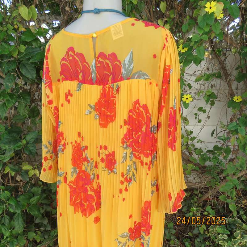 JUDY'S PRIDE vibrant orange slip over permanent pleated lined dress. Crimson flowers. Size 40