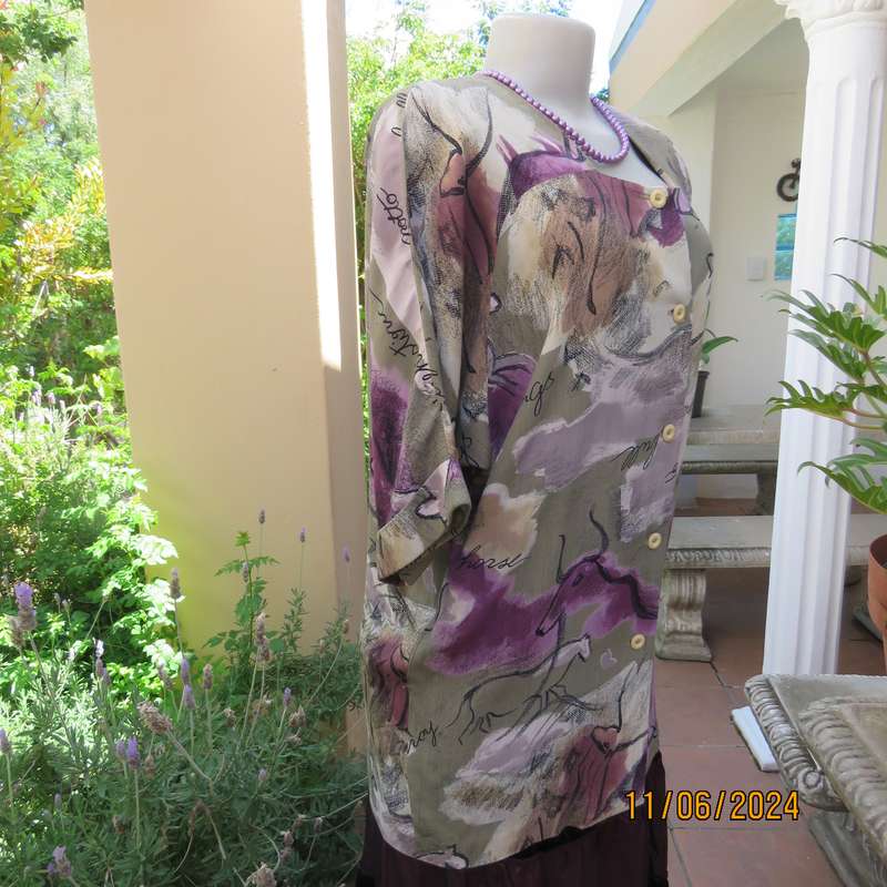 AVANT GARDE uniquely  styled size 36 button down top from Greece. With black animal drawings.As new