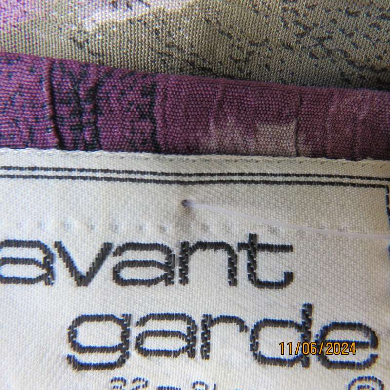AVANT GARDE uniquely  styled size 36 button down top from Greece. With black animal drawings.As new