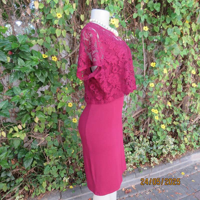 Maroon stretch polyester bodycon slip over dress with acrylic lace top overlay. Size 38