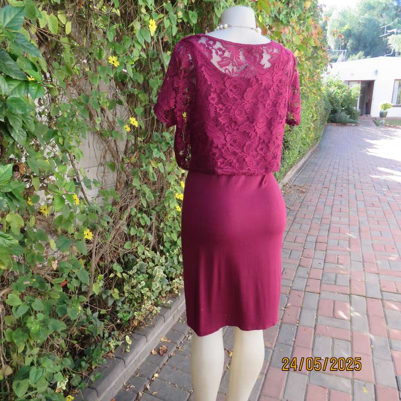 Maroon stretch polyester bodycon slip over dress with acrylic lace top overlay. Size 38