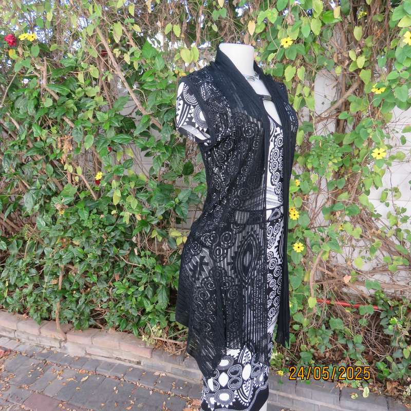 Black acrylic knit lace stitch sleeveless waterfall style cover up. Size 32.