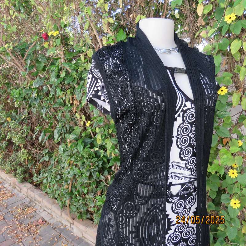 Black acrylic knit lace stitch sleeveless waterfall style cover up. Size 32.