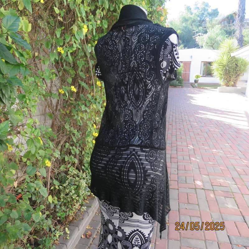 Black acrylic knit lace stitch sleeveless waterfall style cover up. Size 32.