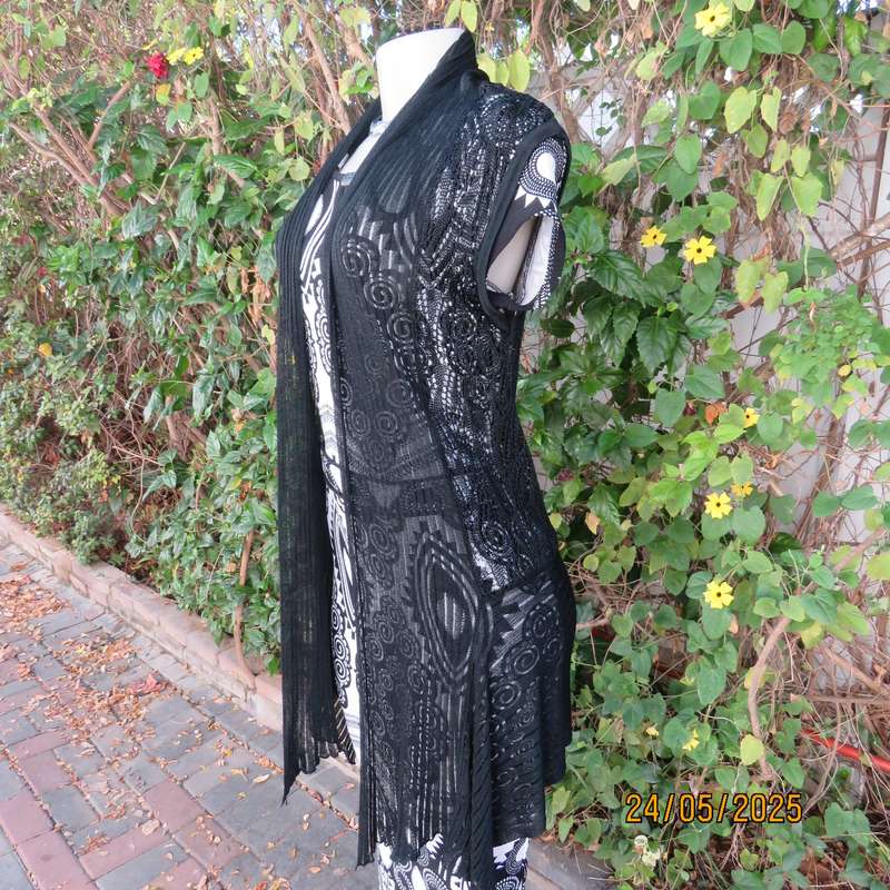 Black acrylic knit lace stitch sleeveless waterfall style cover up. Size 32.