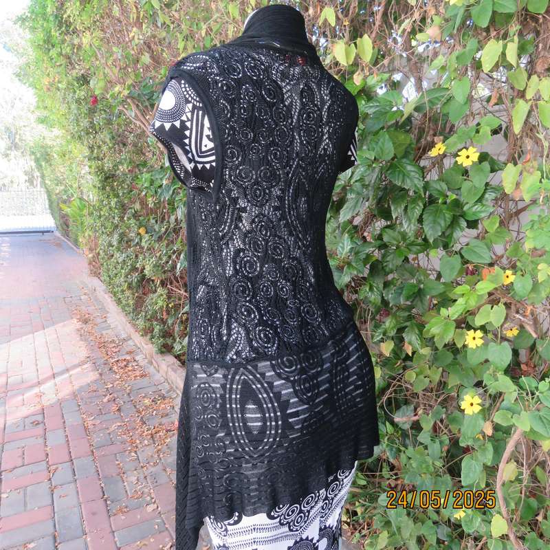 Black acrylic knit lace stitch sleeveless waterfall style cover up. Size 32.