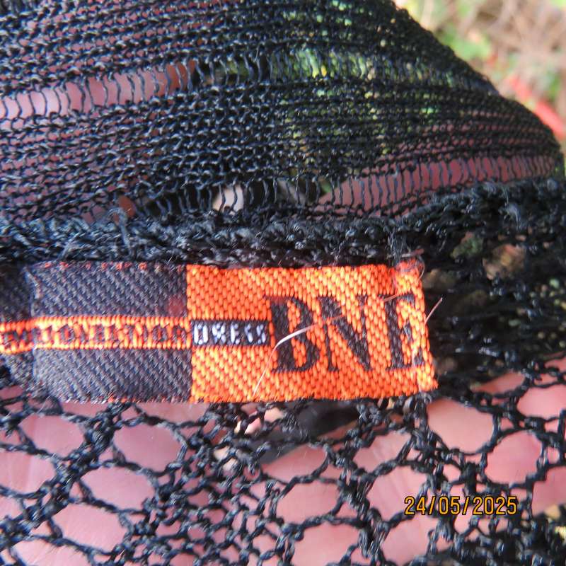 Black acrylic knit lace stitch sleeveless waterfall style cover up. Size 32.