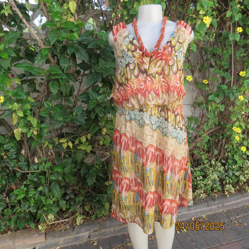 Cool colourful sleeveless dress with frilled V neckline. Size 37. Lined. Elasticated waist.