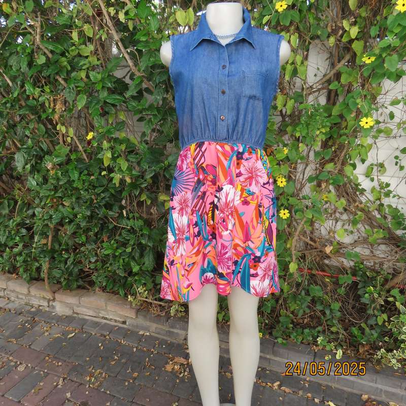 Casual dress with blue denim top and bright floral polyester high-low skirt. Size 34