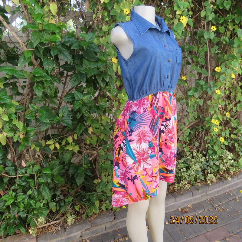 Casual dress with blue denim top and bright floral polyester high-low skirt. Size 34