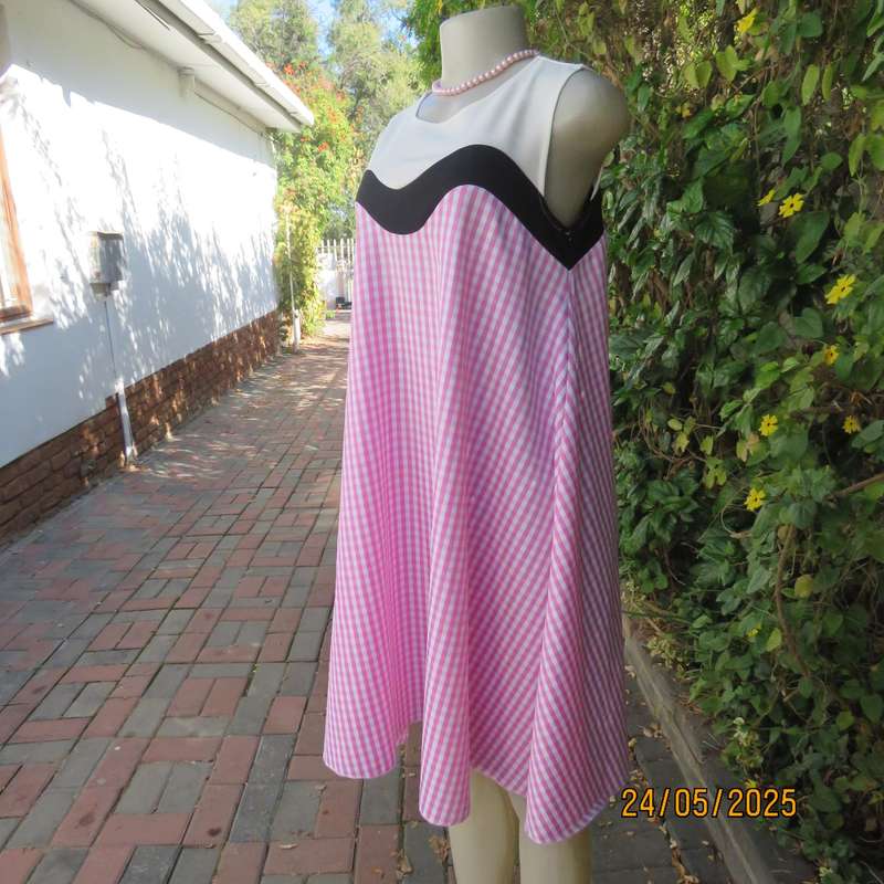 Unique pink-white nylon-rayon blend check wide A-line dress with black-white yoke. Size 36