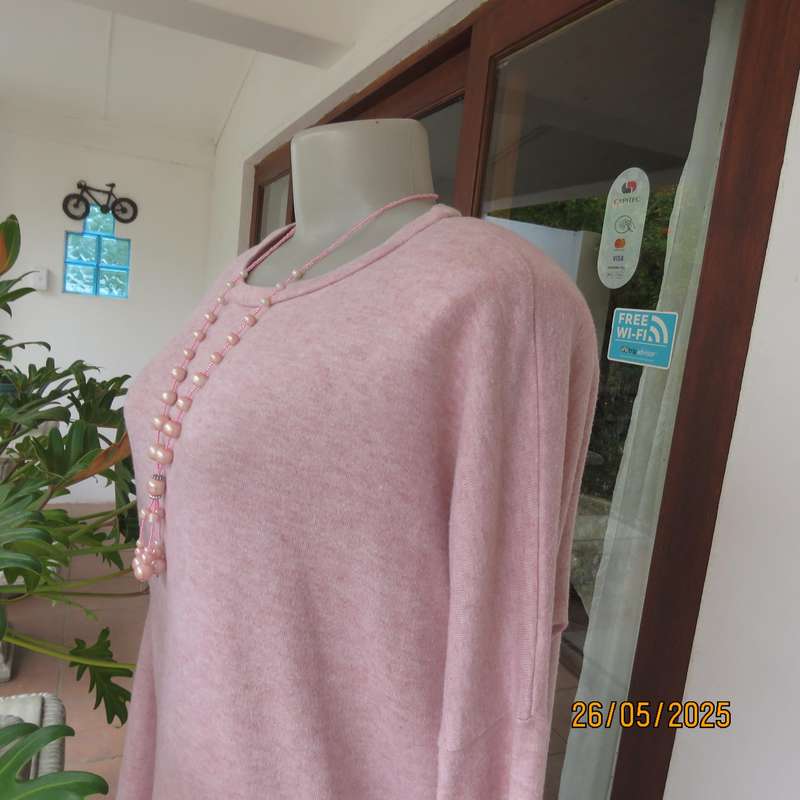 Blush pink warm oversized size 38 slip over poly knit slip over top.