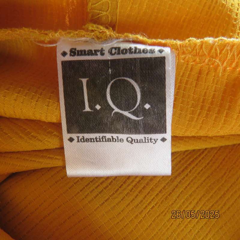 Hooded IQ luxury textured polyester long sleeve top. Short zip-up front opening. Size 42