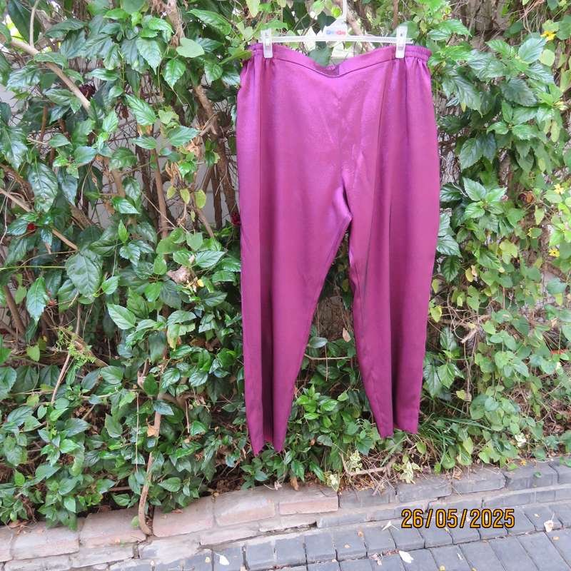 Mulberry colour boutique made shiny silky polyester size 48 pants. As new