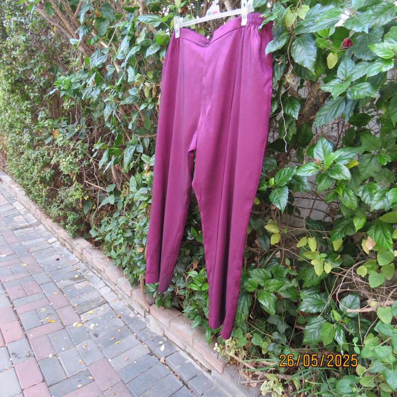 Mulberry colour boutique made shiny silky polyester size 48 pants. As new