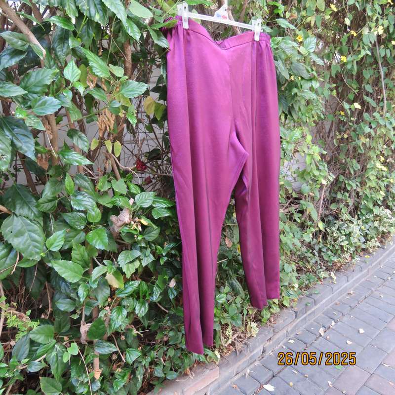 Mulberry colour boutique made shiny silky polyester size 48 pants. As new