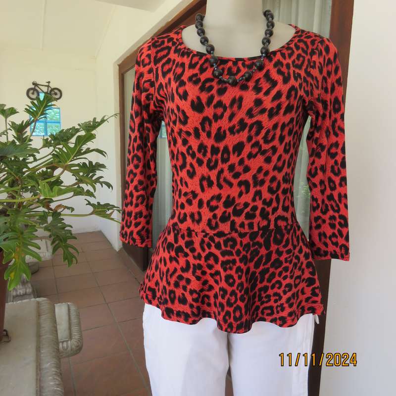 AQARA  pretty red and black animal print peplum style slip over top. Size 32. As new.