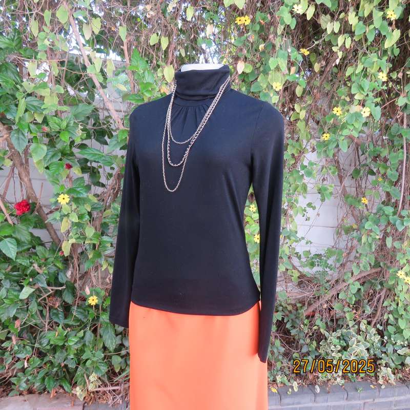 Black long sleeve poloneck top size 30. Neckline front gathered. Cotton stretch.