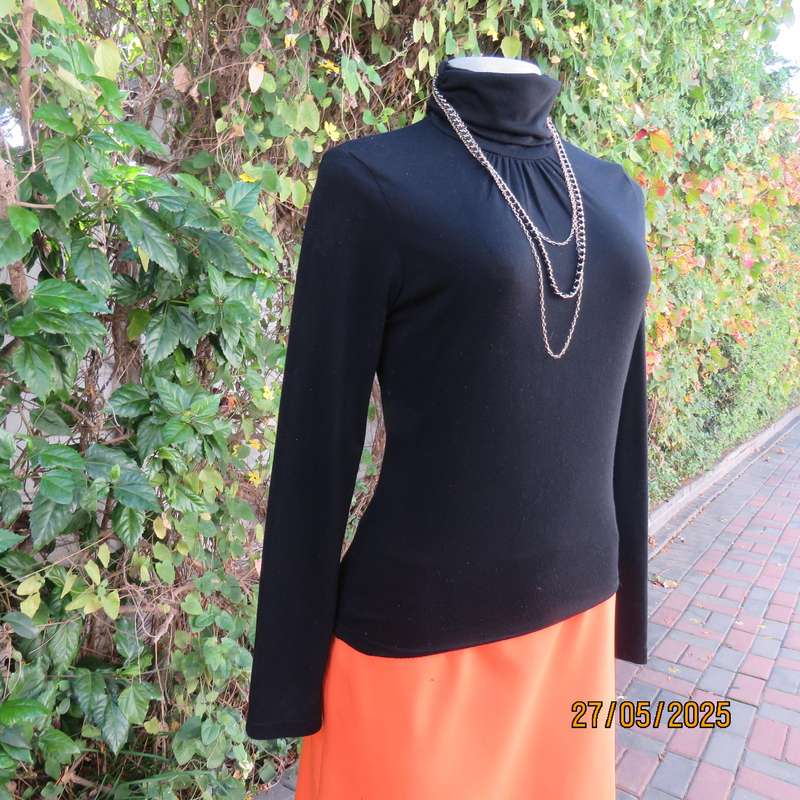 Black long sleeve poloneck top size 30. Neckline front gathered. Cotton stretch.