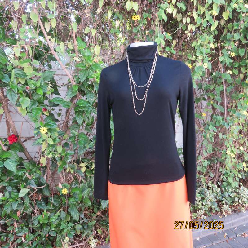 Black long sleeve poloneck top size 30. Neckline front gathered. Cotton stretch.