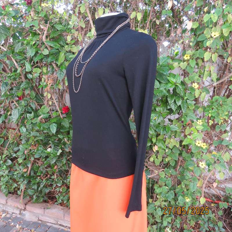 Black long sleeve poloneck top size 30. Neckline front gathered. Cotton stretch.