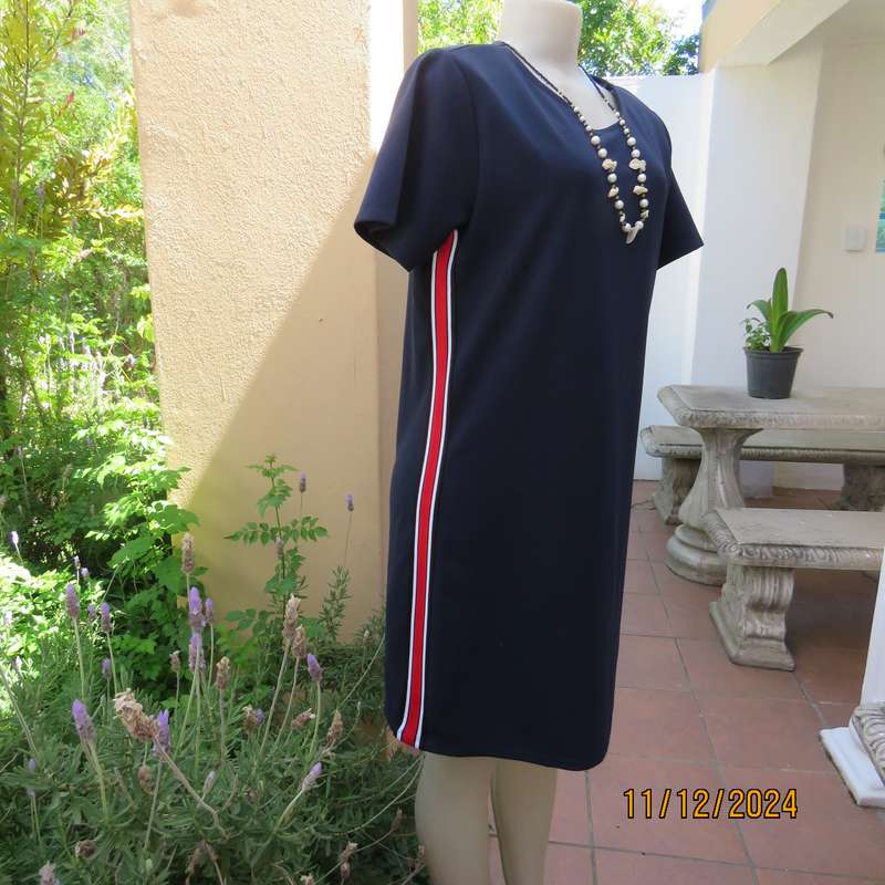 Navy stretch polyester slip over short sleeve dress size 38. Red-white side stripes. As new cond.