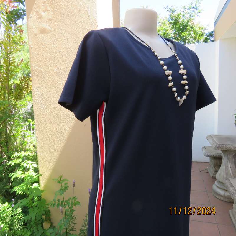 Navy stretch polyester slip over short sleeve dress size 38. Red-white side stripes. As new cond.