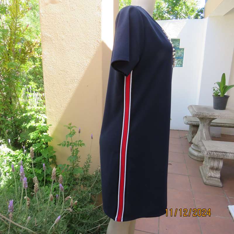 Navy stretch polyester slip over short sleeve dress size 38. Red-white side stripes. As new cond.