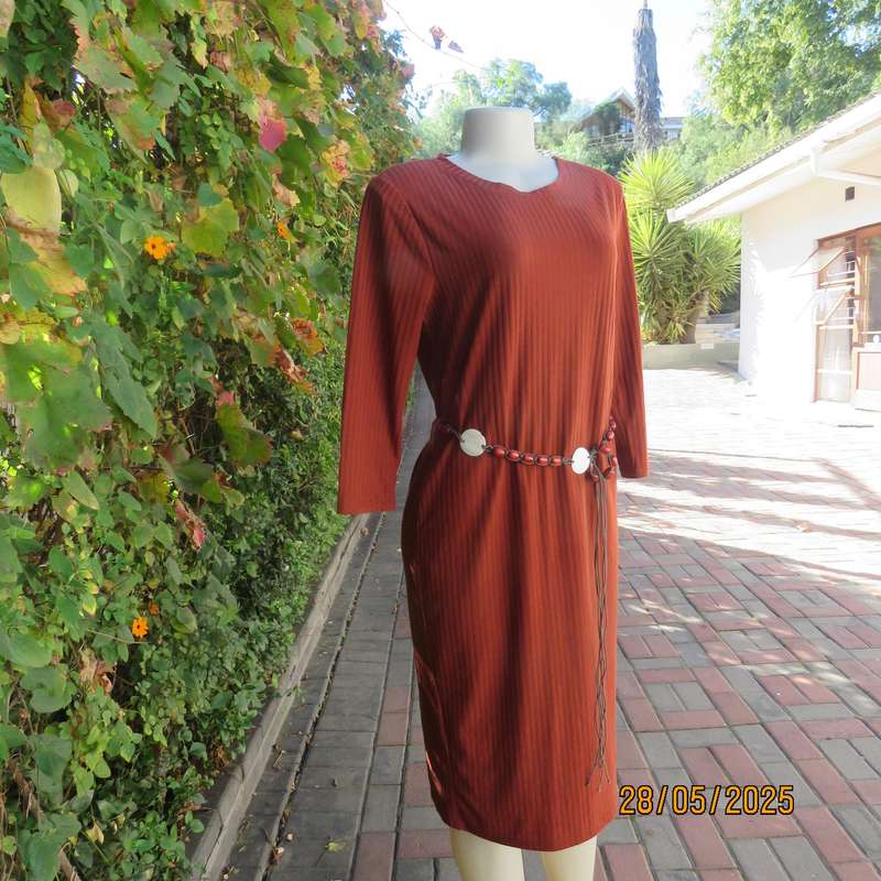 Dark burnt orange long sleeve slip over shift dress in stretch polyester size 36 with belt.