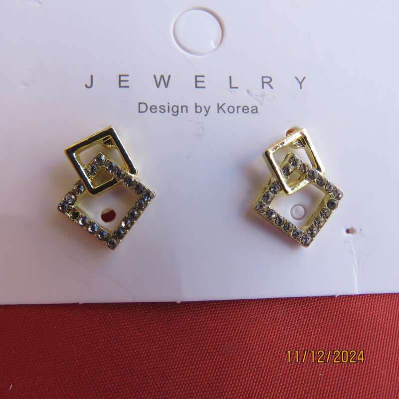 Tiny little gold square earrings with faux diamond stones. Glam factor. New item